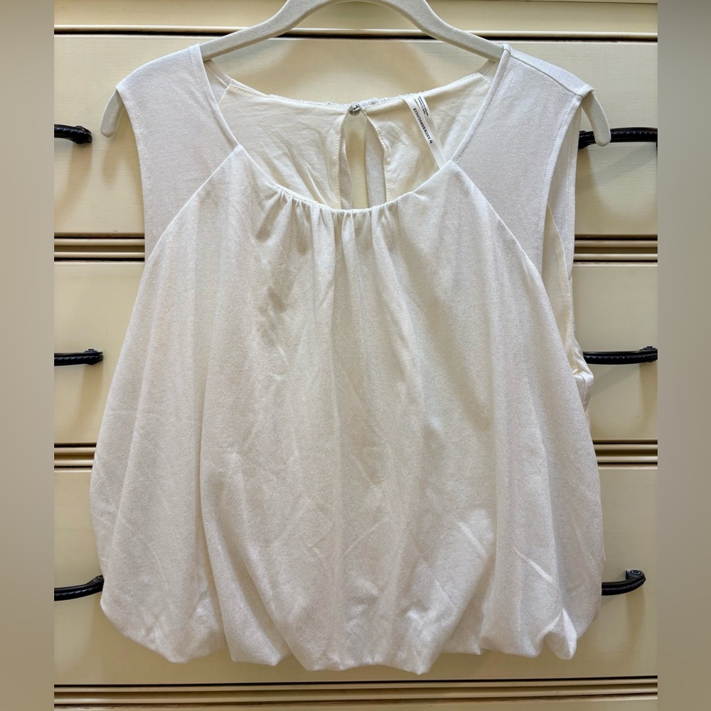 Anthropologie Ivory Bubble hem top